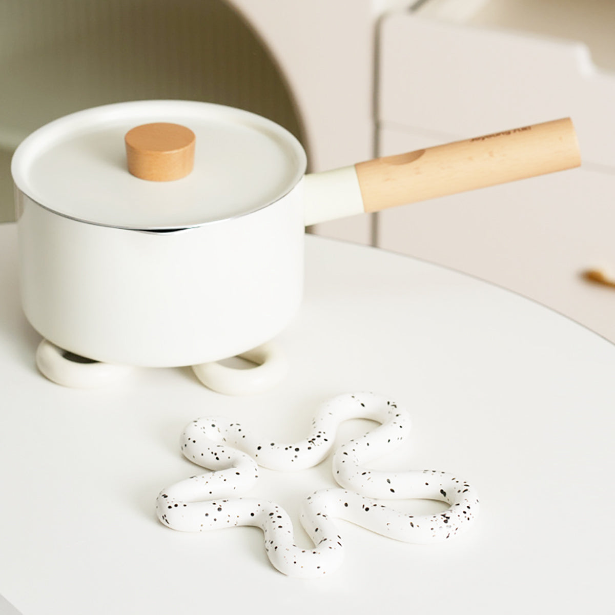 Ceramic Trivet In Artsy Splatter Design